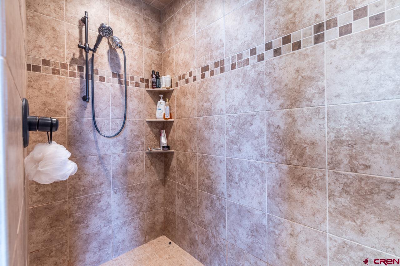 1265 H25 Road Delta, CO 81416 - Photo 33 of 34 a bathroom with a shower