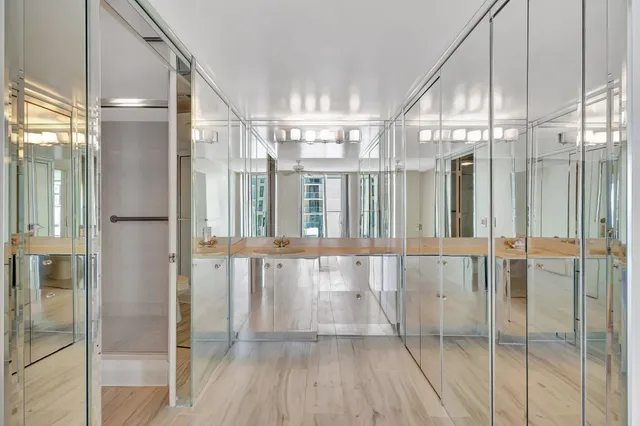 a view of a large room with wooden floor