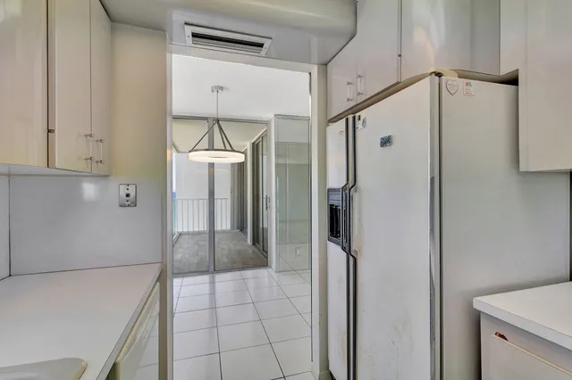 a bathroom with a shower and a mirror