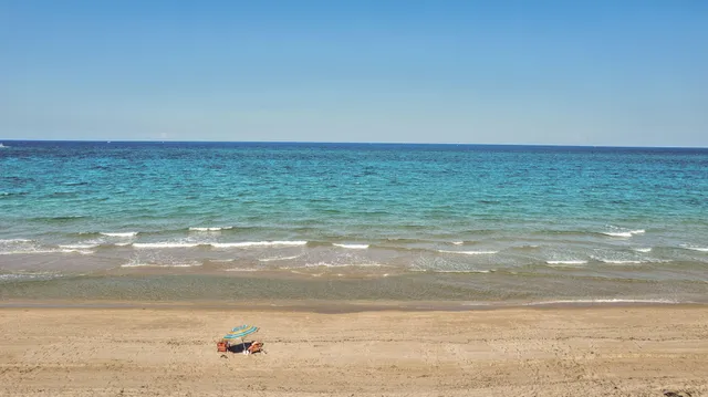 a view of beach and ocean