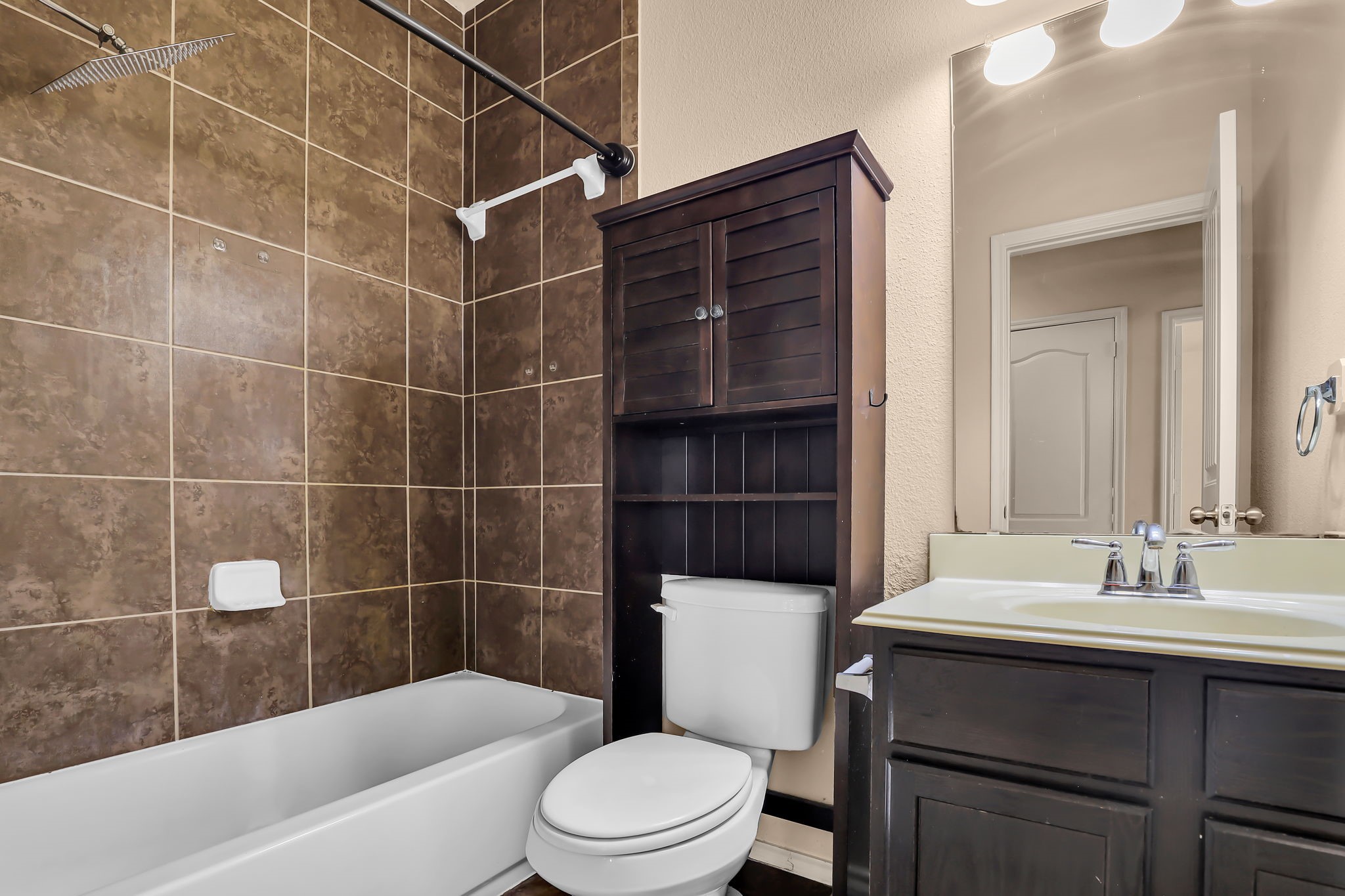21307 Carleen Creek Trail Spring, TX 77379 - Photo 17 of 25 Shared bathroom features shower/tub combo.