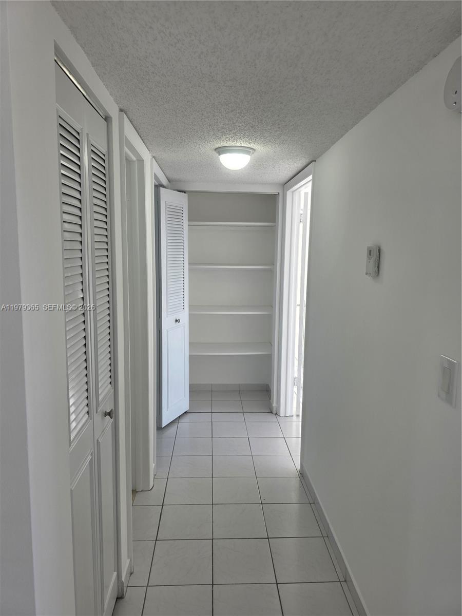 8015 Southwest 107th Avenue, Unit 313 Miami, FL 33173 - Photo 18 of 43 a view of an empty room