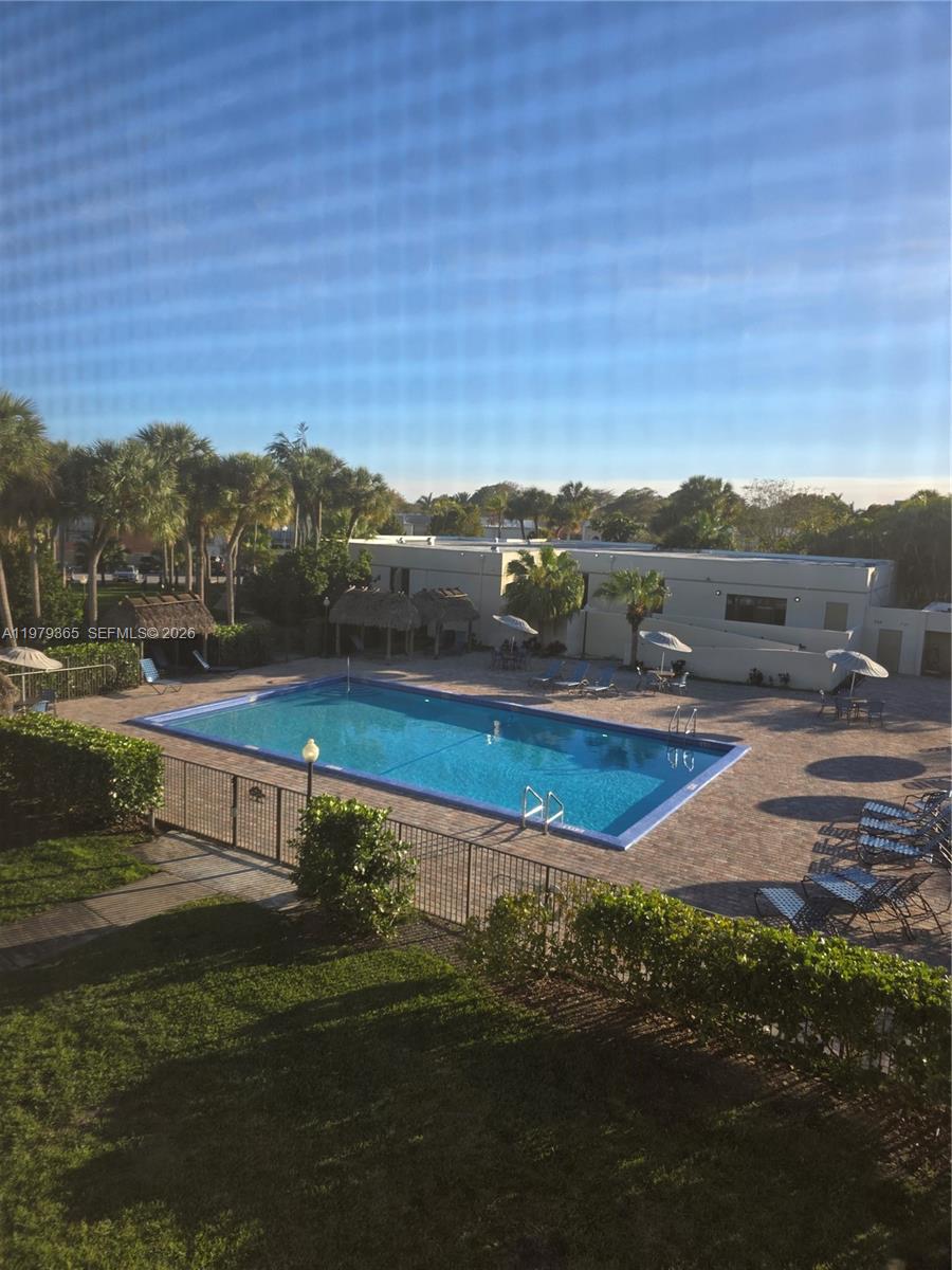 8015 Southwest 107th Avenue, Unit 313 Miami, FL 33173 - Photo 2 of 43 a view of lake with mountain