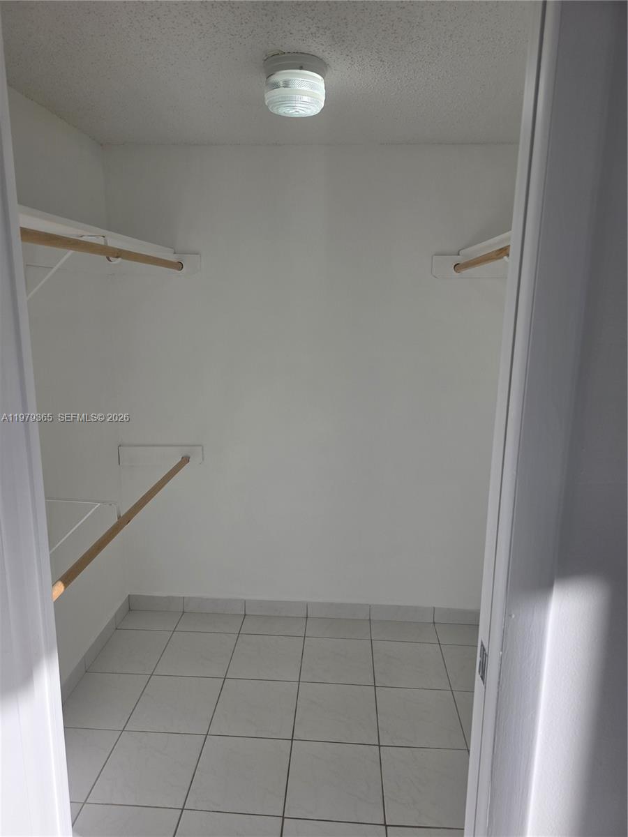 8015 Southwest 107th Avenue, Unit 313 Miami, FL 33173 - Photo 22 of 43 a view of an empty room