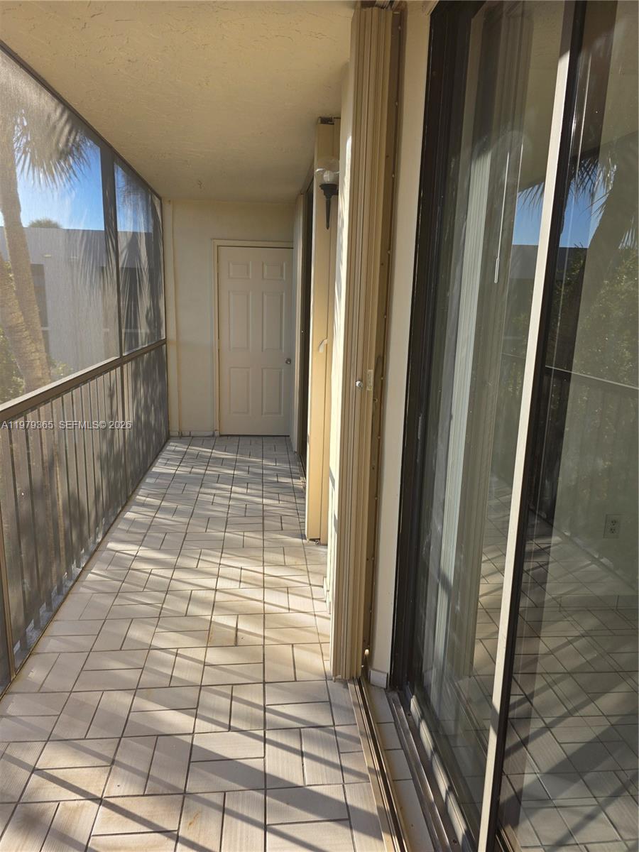 8015 Southwest 107th Avenue, Unit 313 Miami, FL 33173 - Photo 29 of 43 a view of empty room with window
