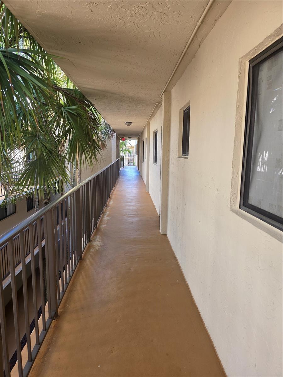 8015 Southwest 107th Avenue, Unit 313 Miami, FL 33173 - Photo 4 of 43 OPEN CATWALKS THROUGHOUT