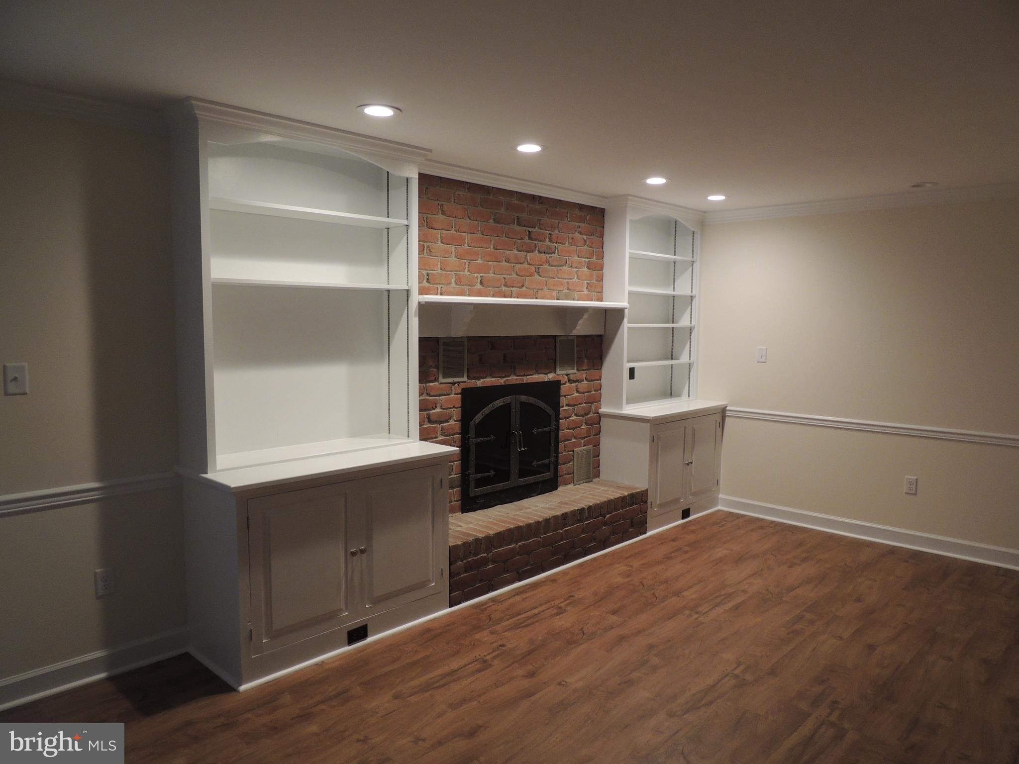 518 Arrowhead Trail Sinking Spring, PA 19608 - Photo 16 of 63 fireplace with book shelves