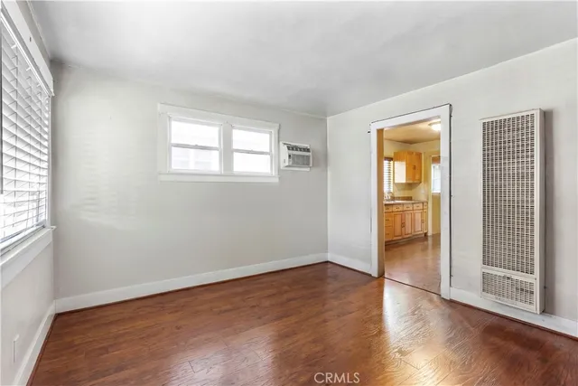 a kitchen with a sink cabinets and window