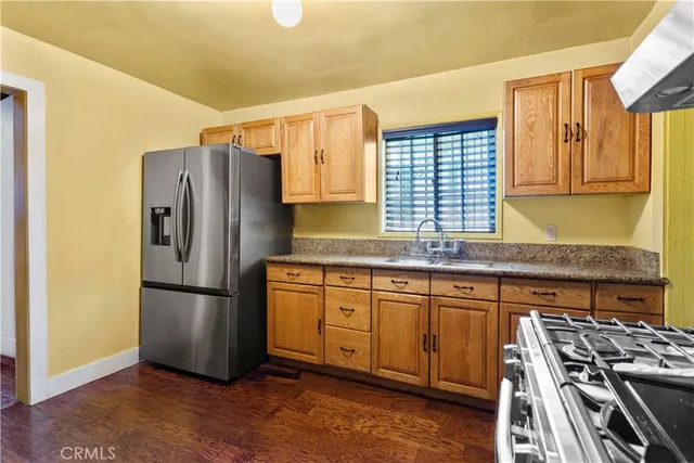 a view of a bathroom with a sink and a mirror