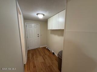 1581 Snapper Street Southwest Shallotte, NC 28470 - Photo 14 of 22 Washer & dryer room with cabinets.
