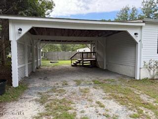 1581 Snapper Street Southwest Shallotte, NC 28470 - Photo 4 of 22 Attached 2 car carport with side entry to home.