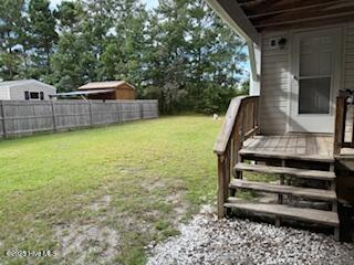 1581 Snapper Street Southwest Shallotte, NC 28470 - Photo 5 of 22 Side entry.