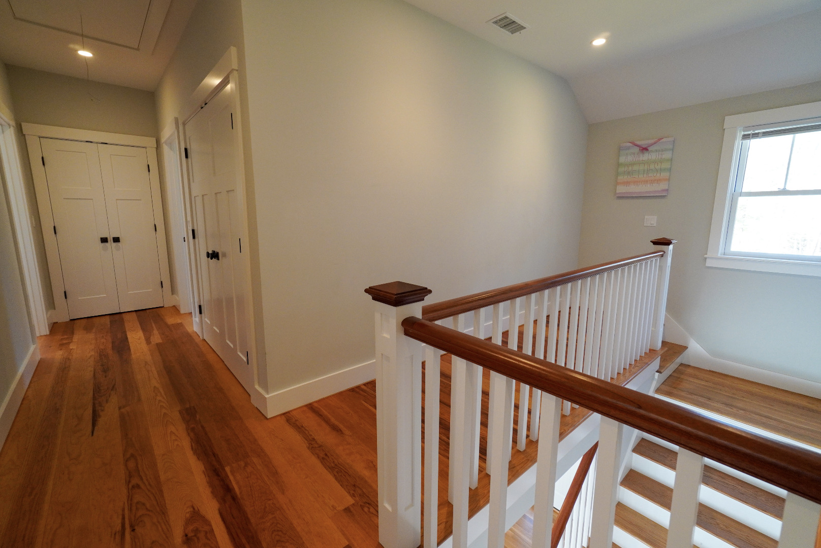 3 Sengekontacket Road Oak Bluffs, MA 02557 - Photo 17 of 34 a view of a hallway with wooden floor and stairs