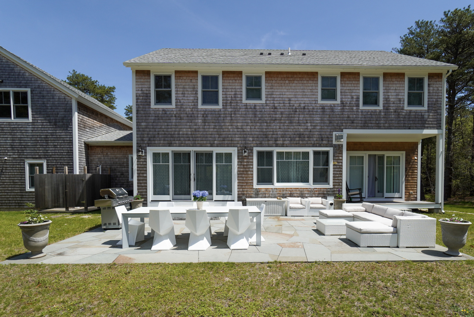 3 Sengekontacket Road Oak Bluffs, MA 02557 - Photo 30 of 34 a front view of a house with swimming pool and glass windows