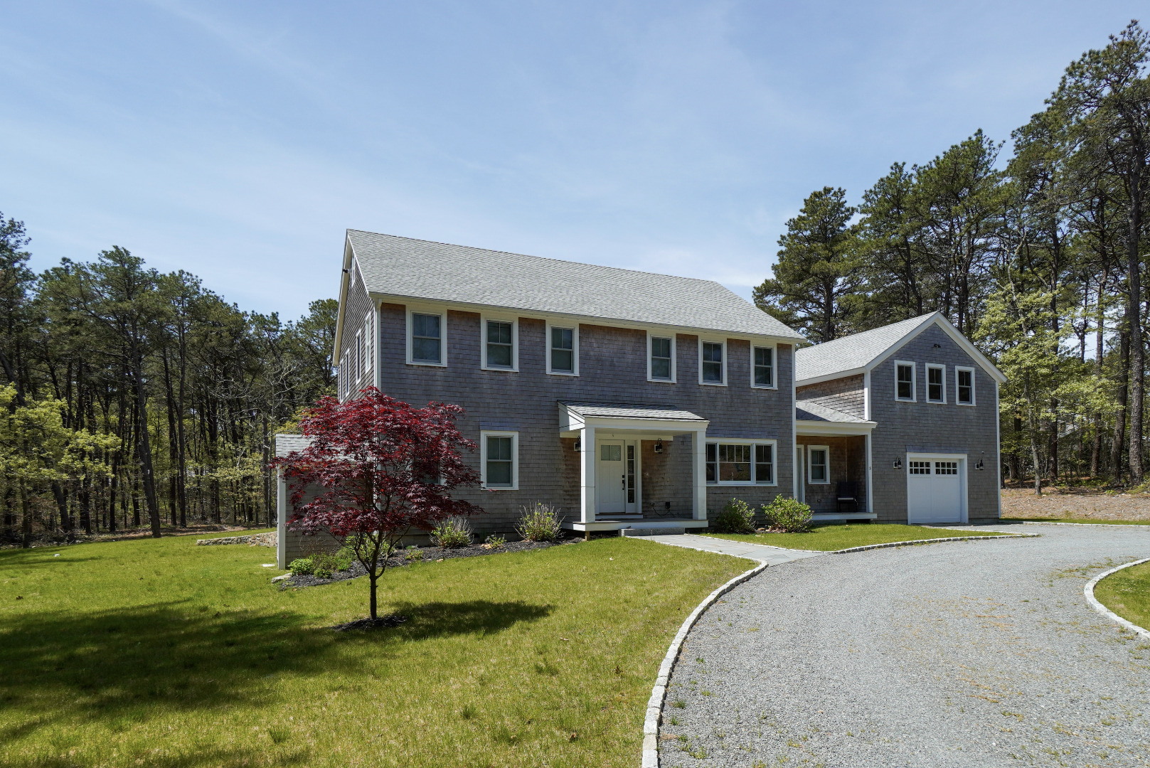 3 Sengekontacket Road Oak Bluffs, MA 02557 - Photo 3 of 34 a front view of a house with a yard