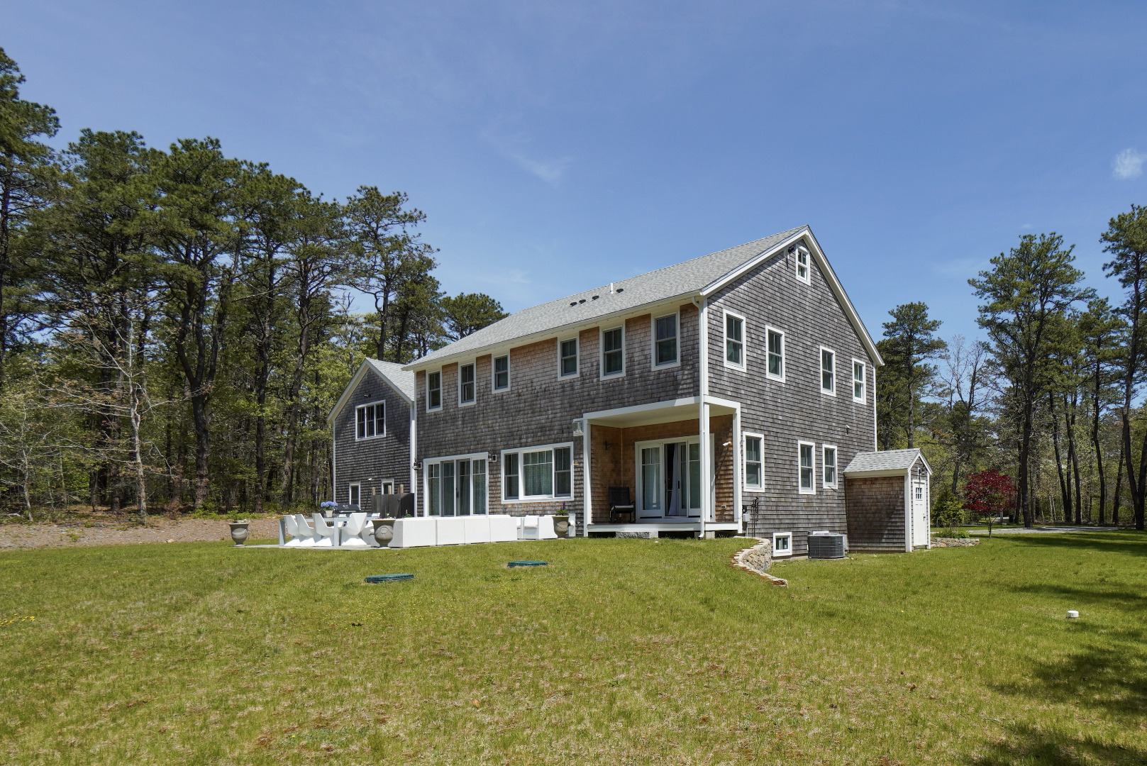 3 Sengekontacket Road Oak Bluffs, MA 02557 - Photo 31 of 34 a front view of a house with a yard