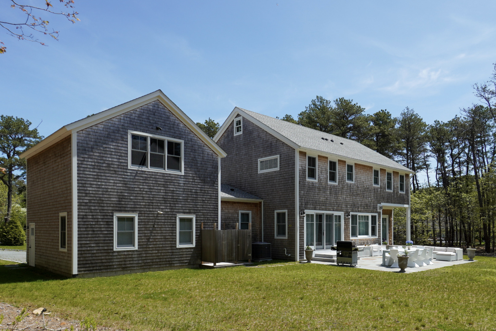 3 Sengekontacket Road Oak Bluffs, MA 02557 - Photo 33 of 34 a front view of a house with a yard