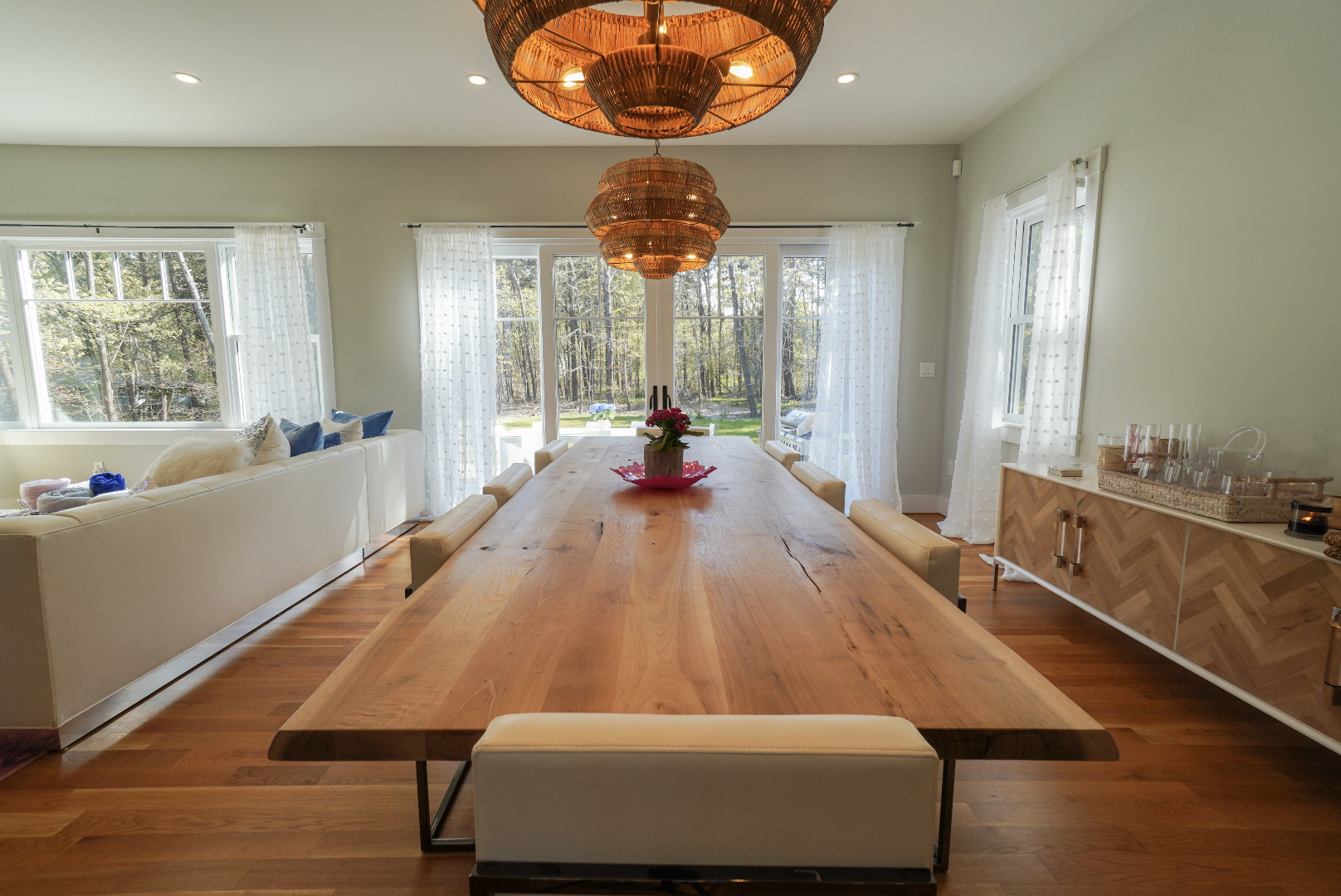 3 Sengekontacket Road Oak Bluffs, MA 02557 - Photo 7 of 34 a dining room with wooden floor and large windows