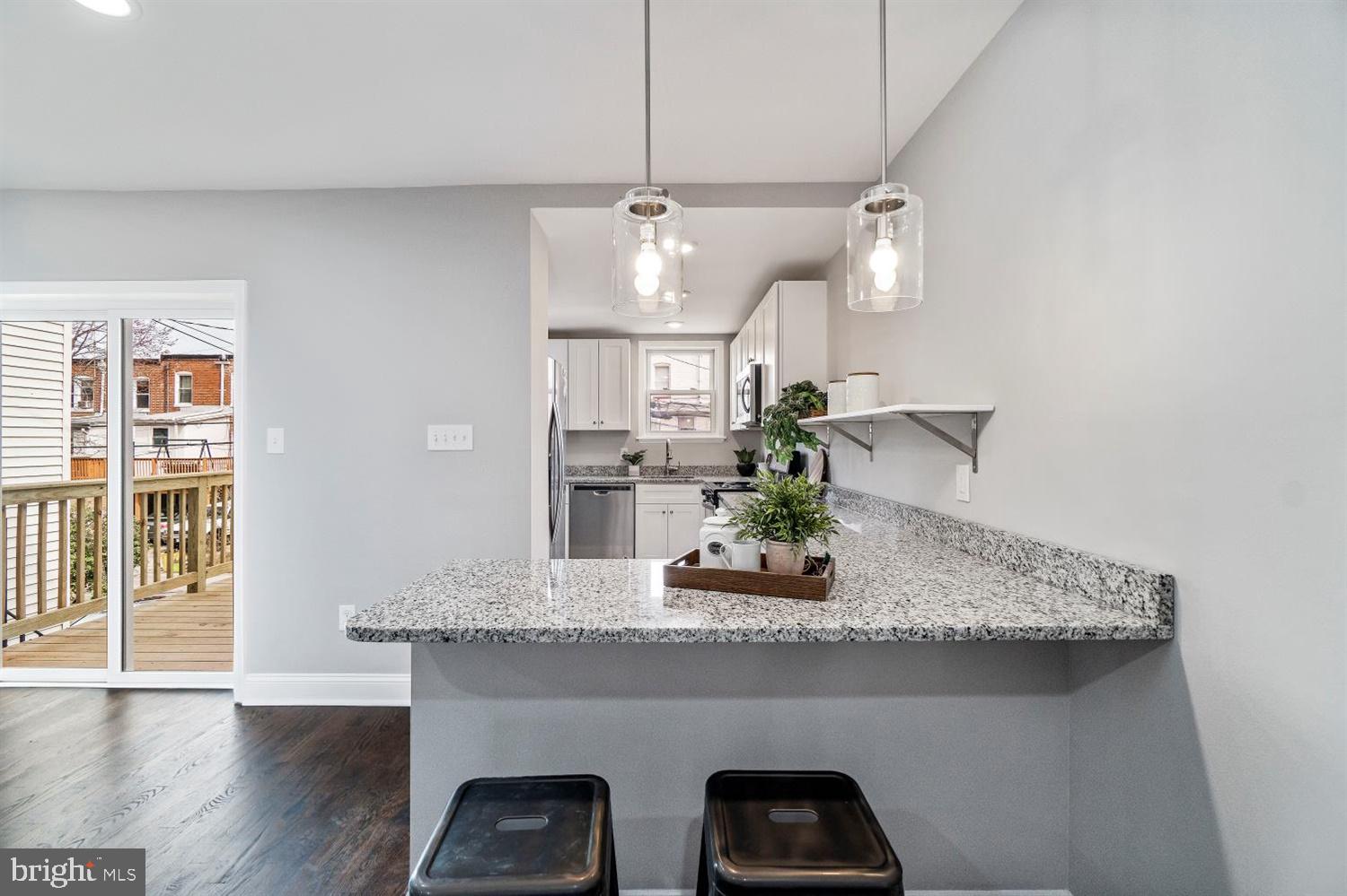 3609 Elkader Road Baltimore, MD 21218 - Photo 13 of 35 Kitchen with Breakfast Bar