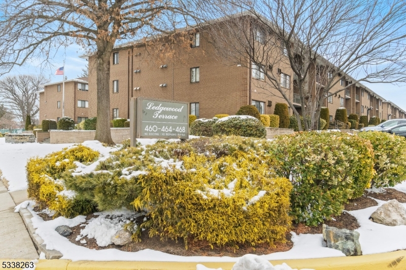 468 Liberty Street, Unit 101 Little Ferry, NJ 07643 - Photo 2 of 18 a view of a house with a yard