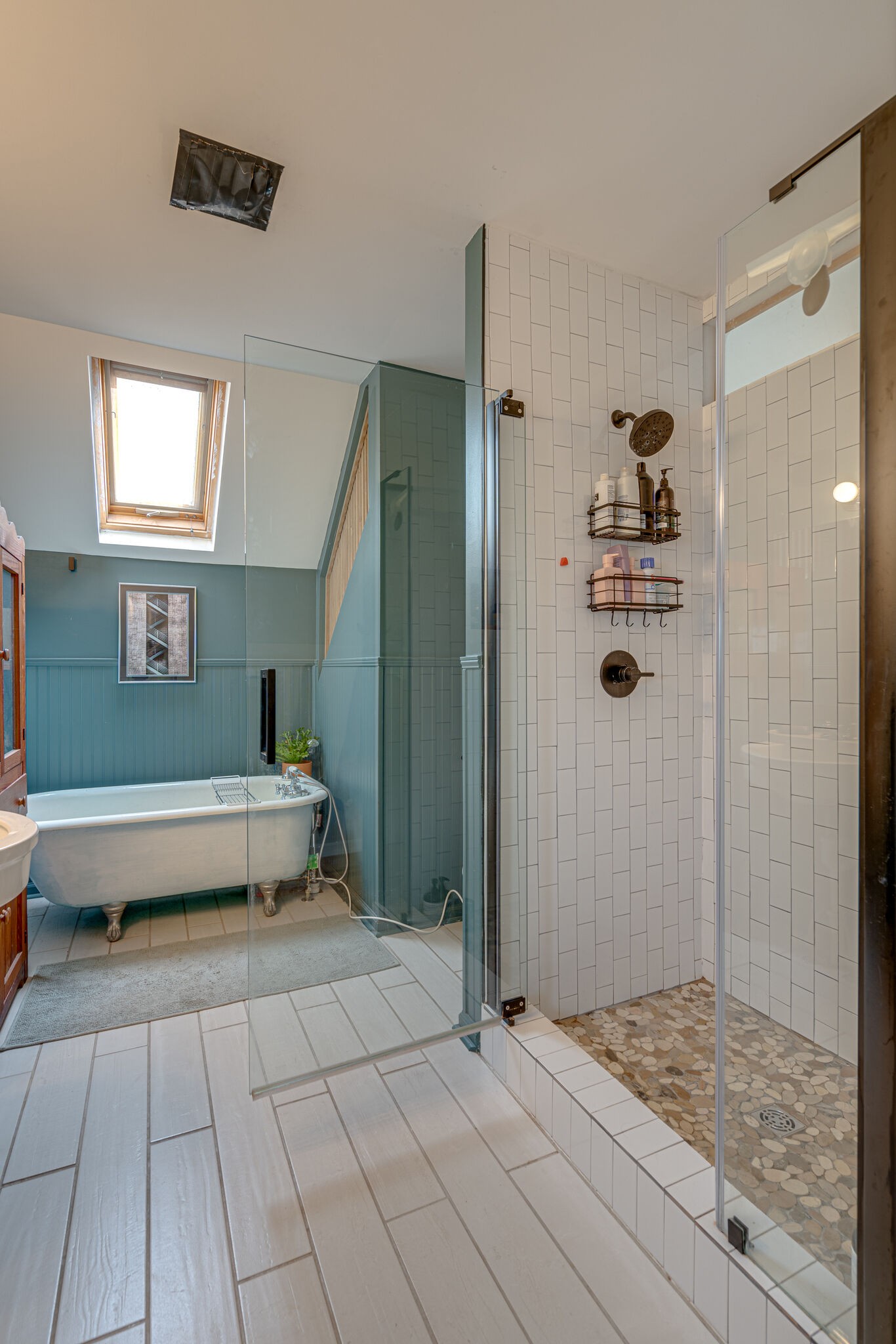 606 3rd Avenue West Springfield, TN 37172 - Photo 23 of 47 a bathroom with a bathtub and a shower