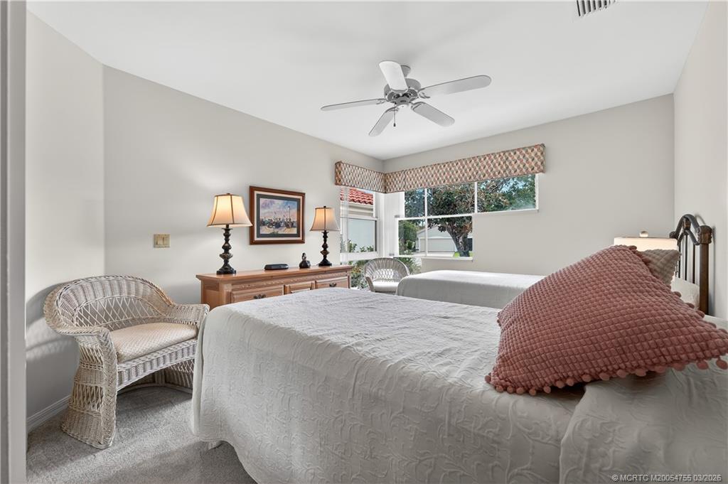 13319 Northwest Maplewood Road Palm City, FL 34990 - Photo 23 of 42 Guest Bedroom