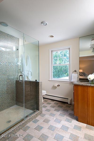 50 Old Orchard Road Riverside, CT 06878 - Photo 16 of 16 a spacious bathroom with a large tub shower and window