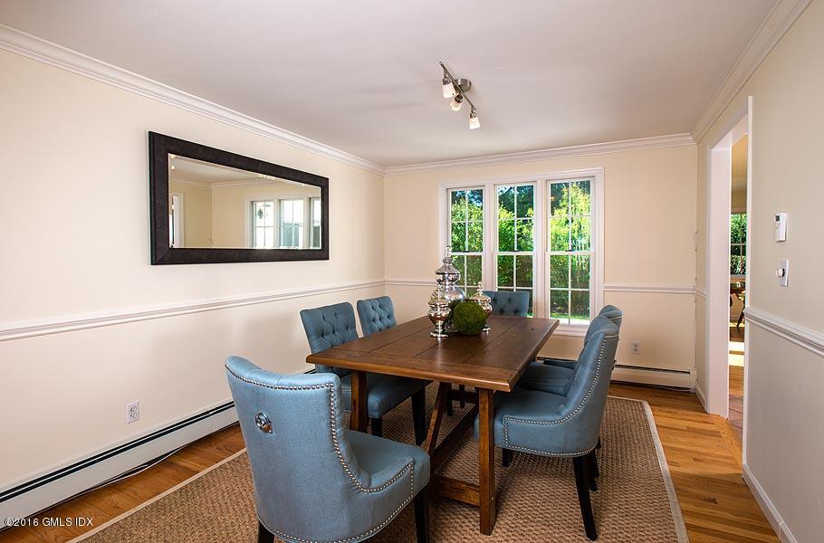 50 Old Orchard Road Riverside, CT 06878 - Photo 8 of 16 a view of a dining room with furniture window and outside view