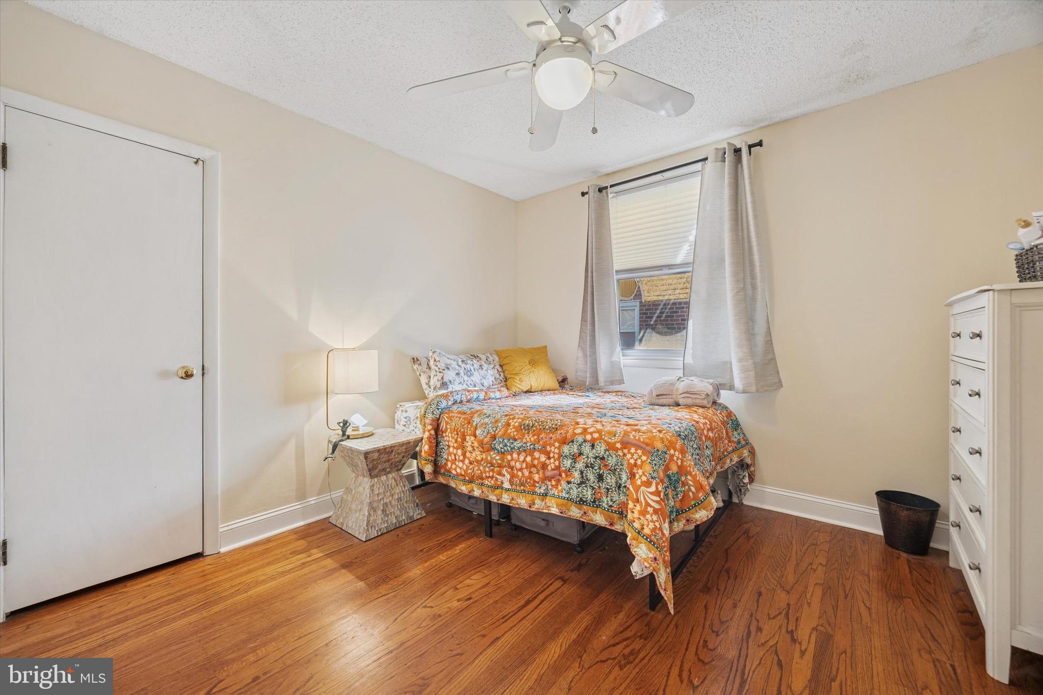 7025 Valley Avenue Philadelphia, PA 19128 - Photo 11 of 25 a bedroom with a bed and a walk in closet