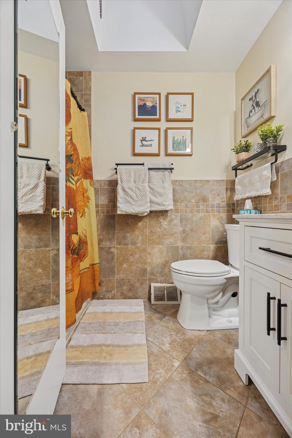 7025 Valley Avenue Philadelphia, PA 19128 - Photo 12 of 25 a bathroom with a toilet and a shower