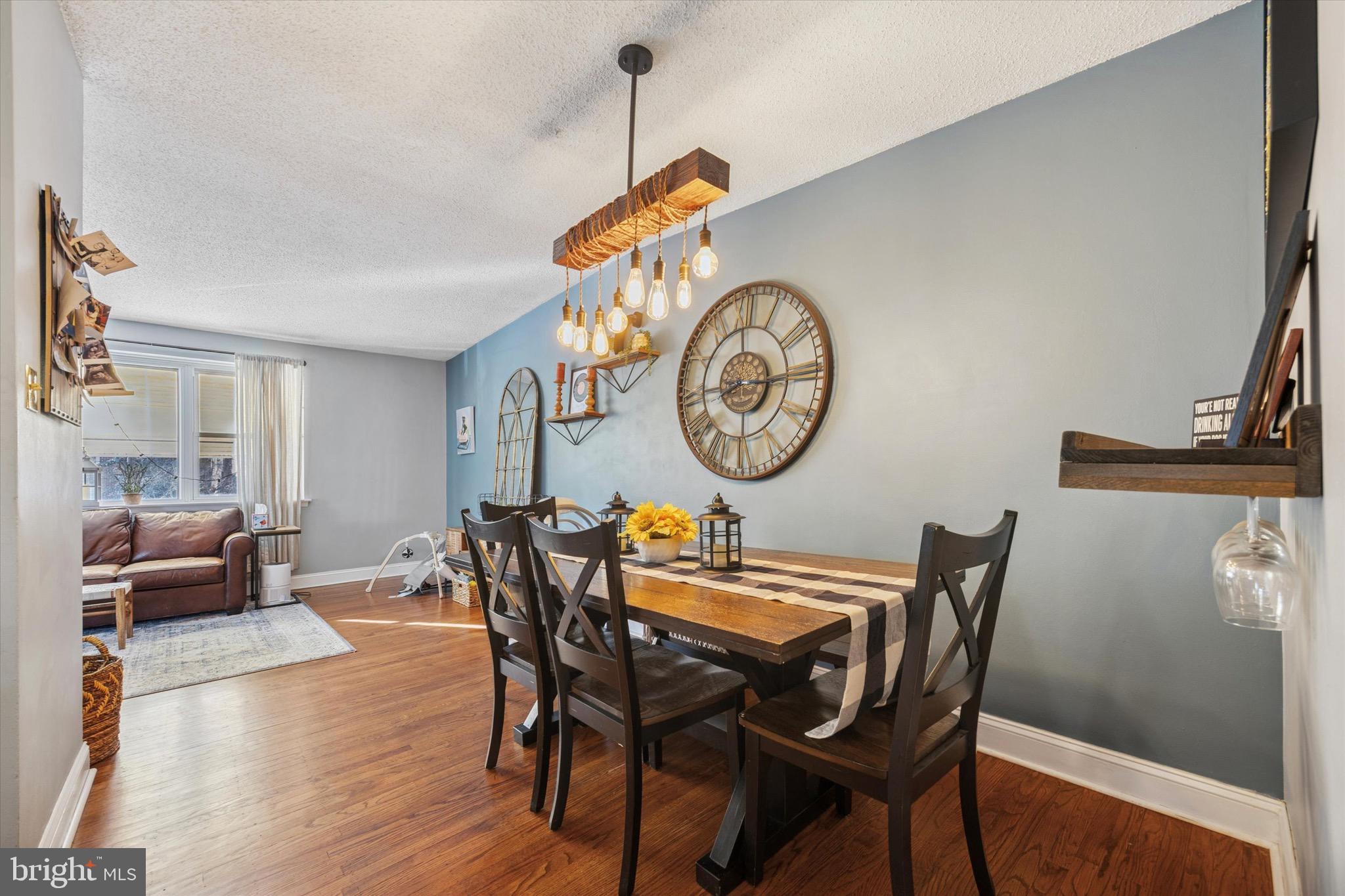 7025 Valley Avenue Philadelphia, PA 19128 - Photo 5 of 25 a view of a dining room with furniture and a chandelier