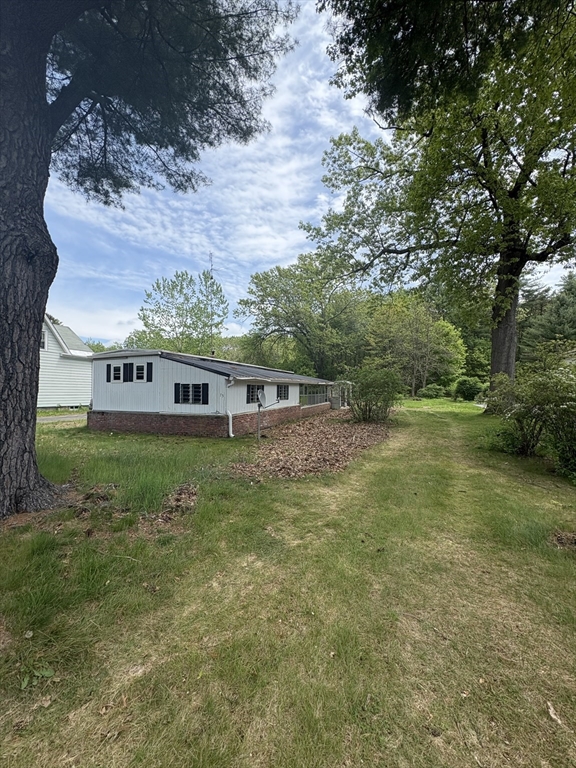 75 Hillside Road Montague, MA 01351 - Photo 2 of 11 a view of an outdoor space and yard