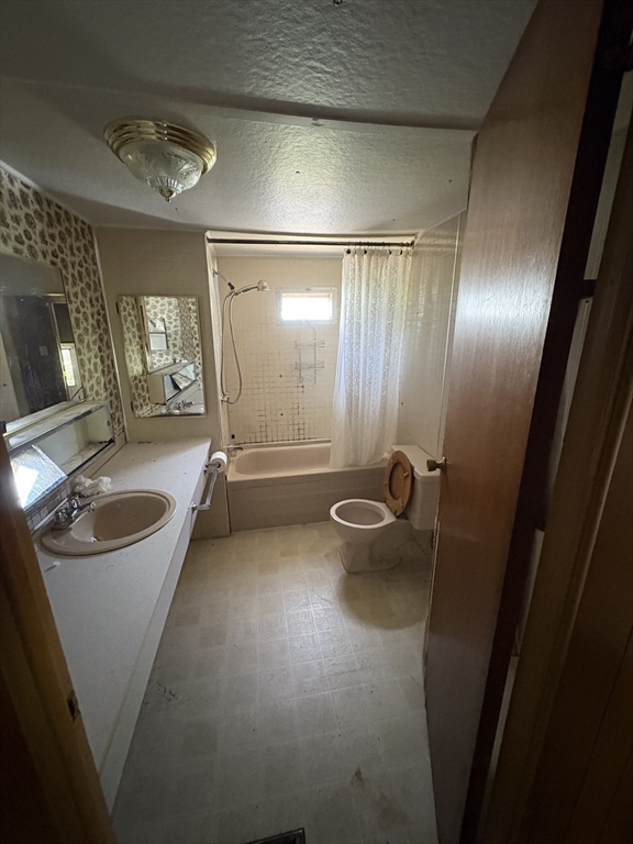 75 Hillside Road Montague, MA 01351 - Photo 9 of 11 a bathroom with a sink a tub and mirror