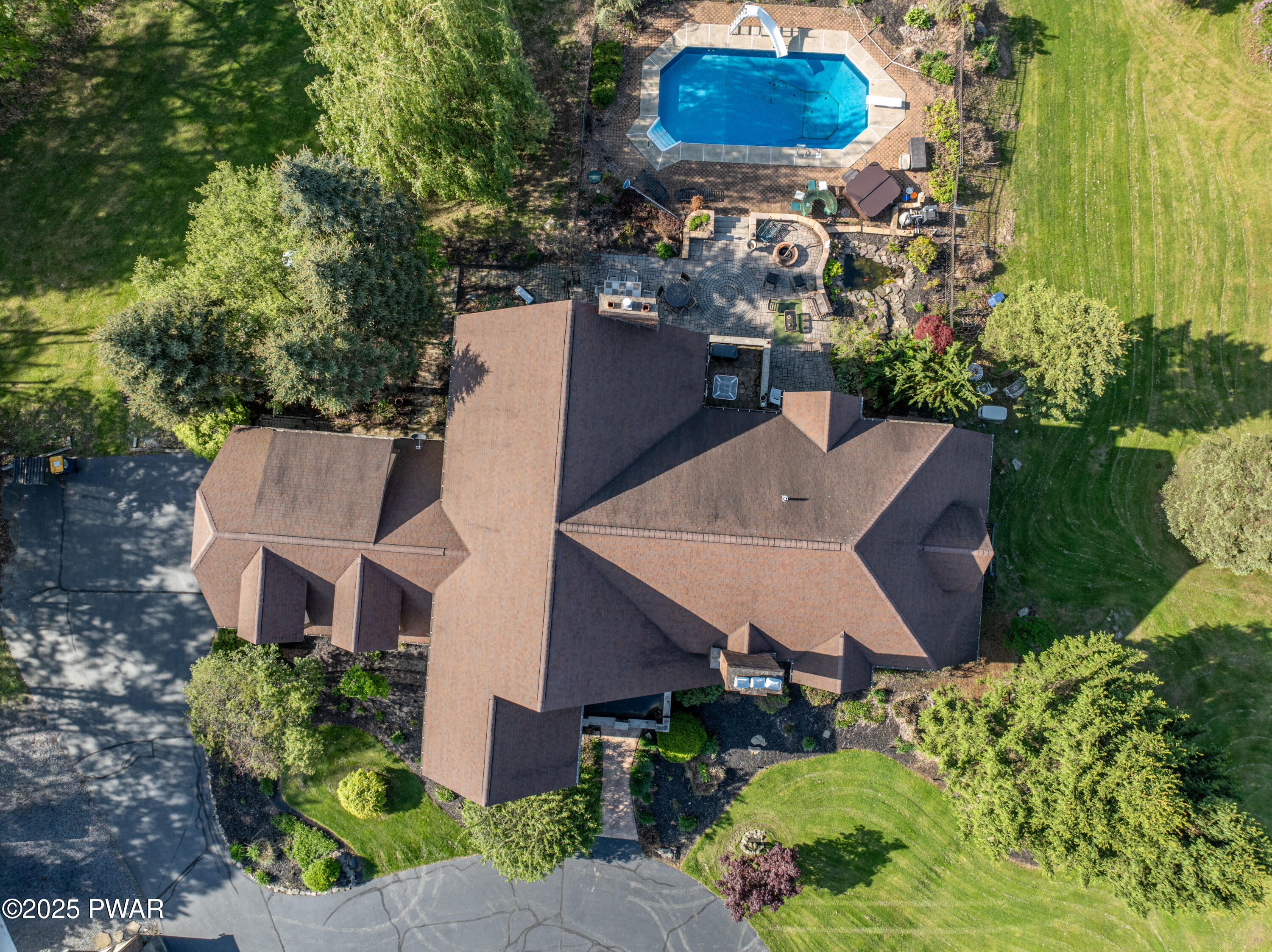 555 Valley View Road Dallas, PA 18612 - Photo 75 of 99 an aerial view of a house with garden space and street view
