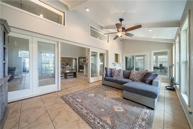 a living room with furniture and a rug
