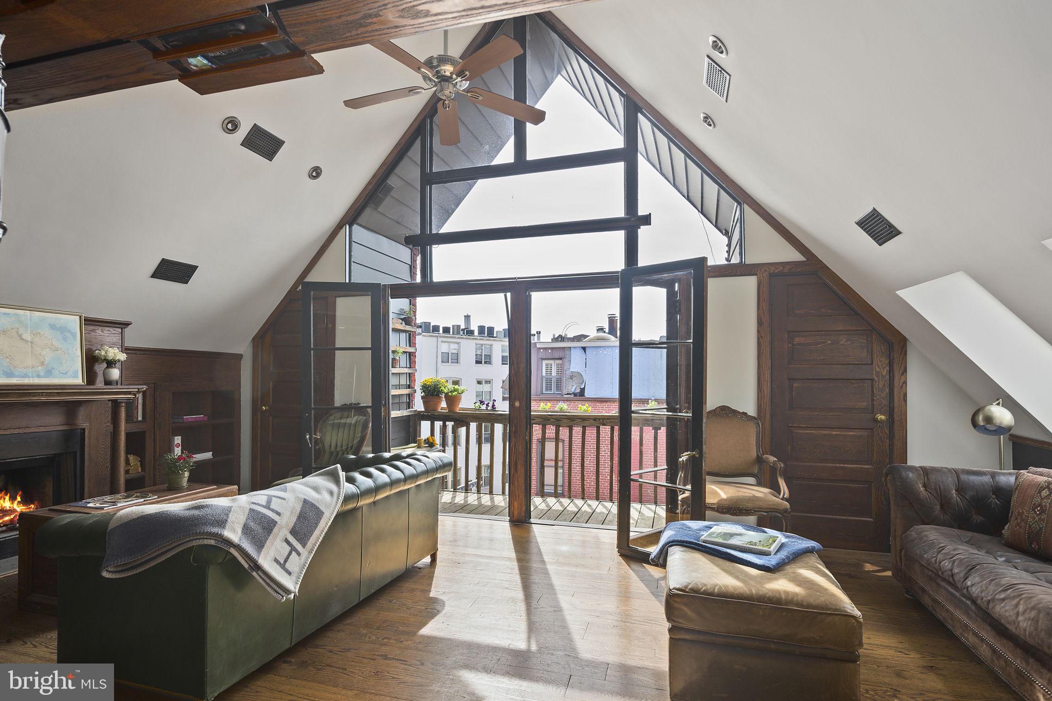 1624 U Street Northwest, Unit 400 Washington, DC 20009 - Photo 4 of 33 A-Frame ceiling & wall of windows