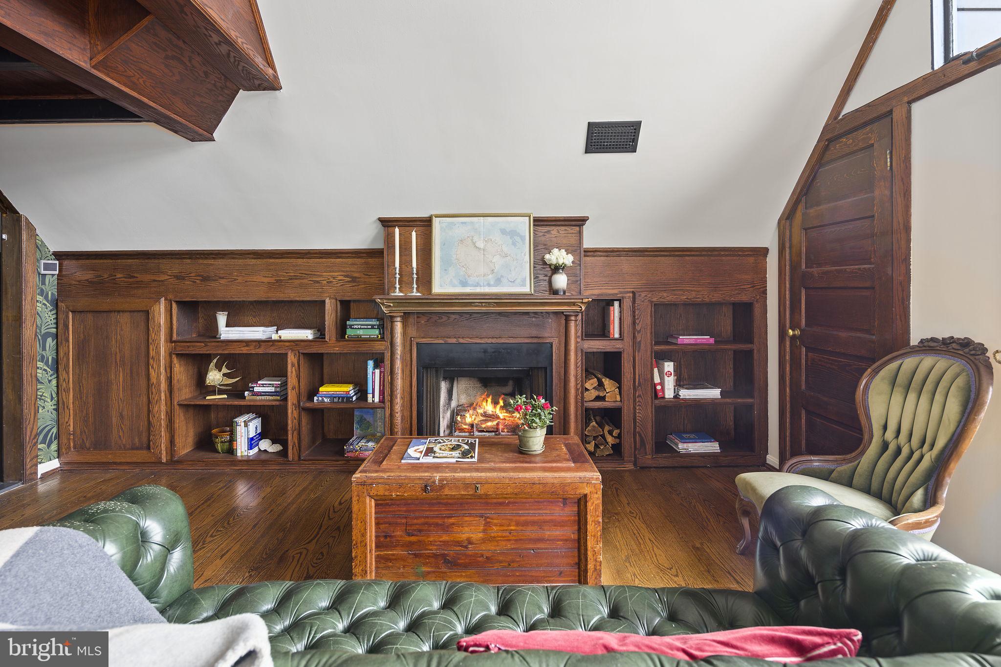 1624 U Street Northwest, Unit 400 Washington, DC 20009 - Photo 7 of 33 Wood burning fireplace surrounded with built-ins