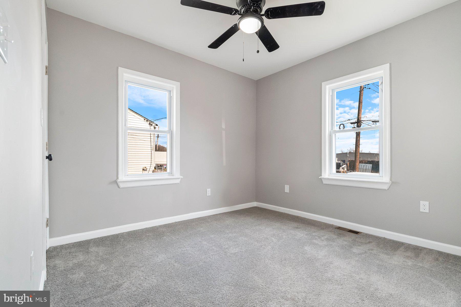 4 North Point Terrace Baltimore, MD 21222 - Photo 13 of 32 a view of a room with window and ceiling fan