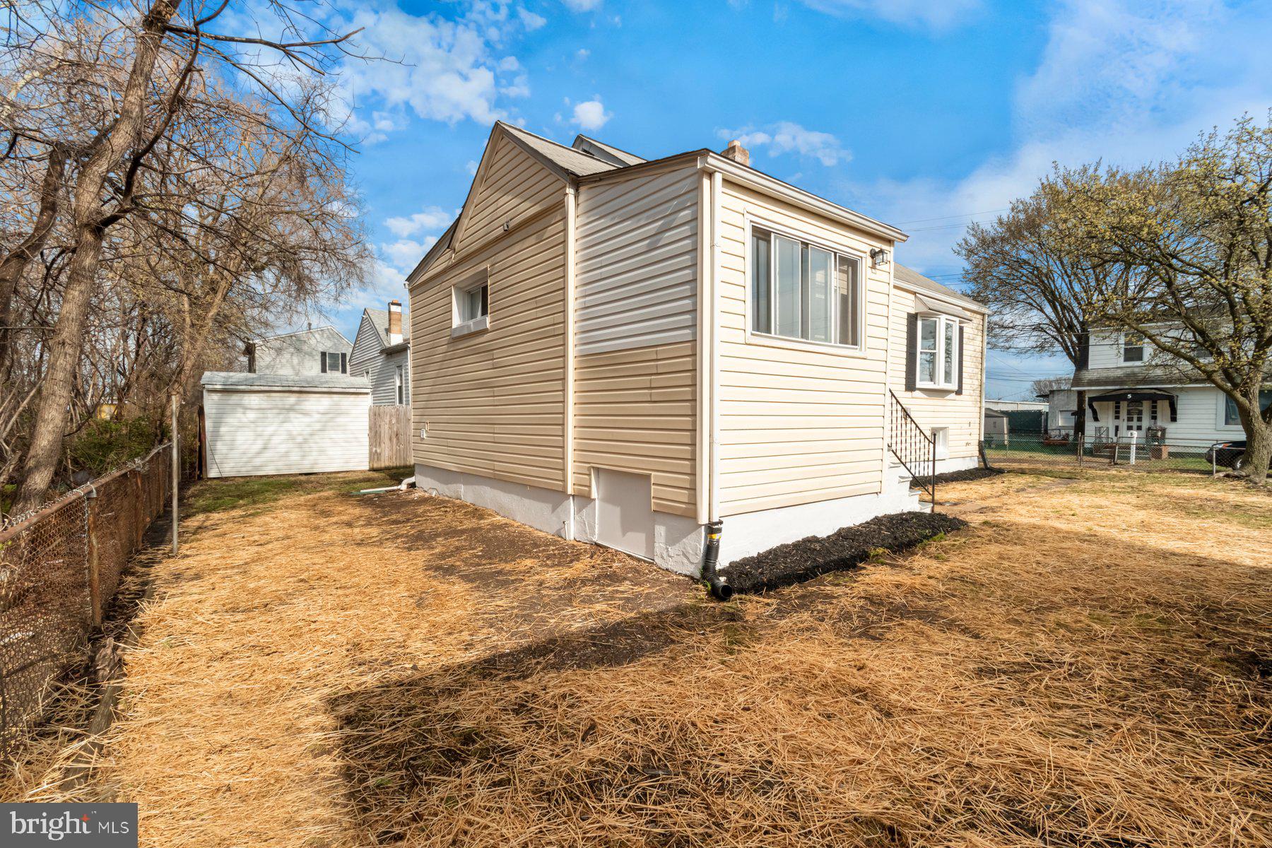 4 North Point Terrace Baltimore, MD 21222 - Photo 27 of 32 a view of a house with a yard