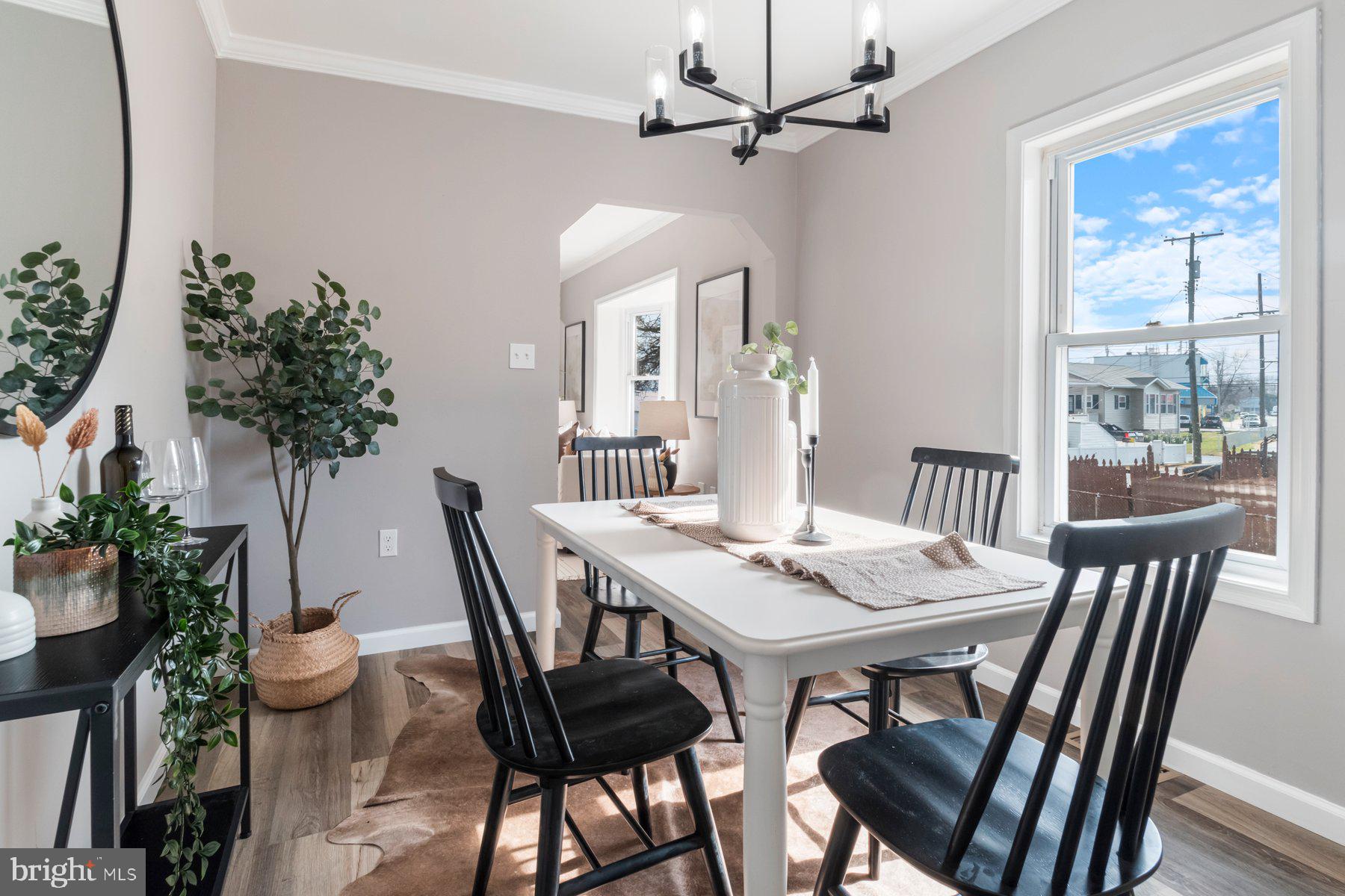 4 North Point Terrace Baltimore, MD 21222 - Photo 7 of 32 a view of a dining room with furniture window and wooden floor