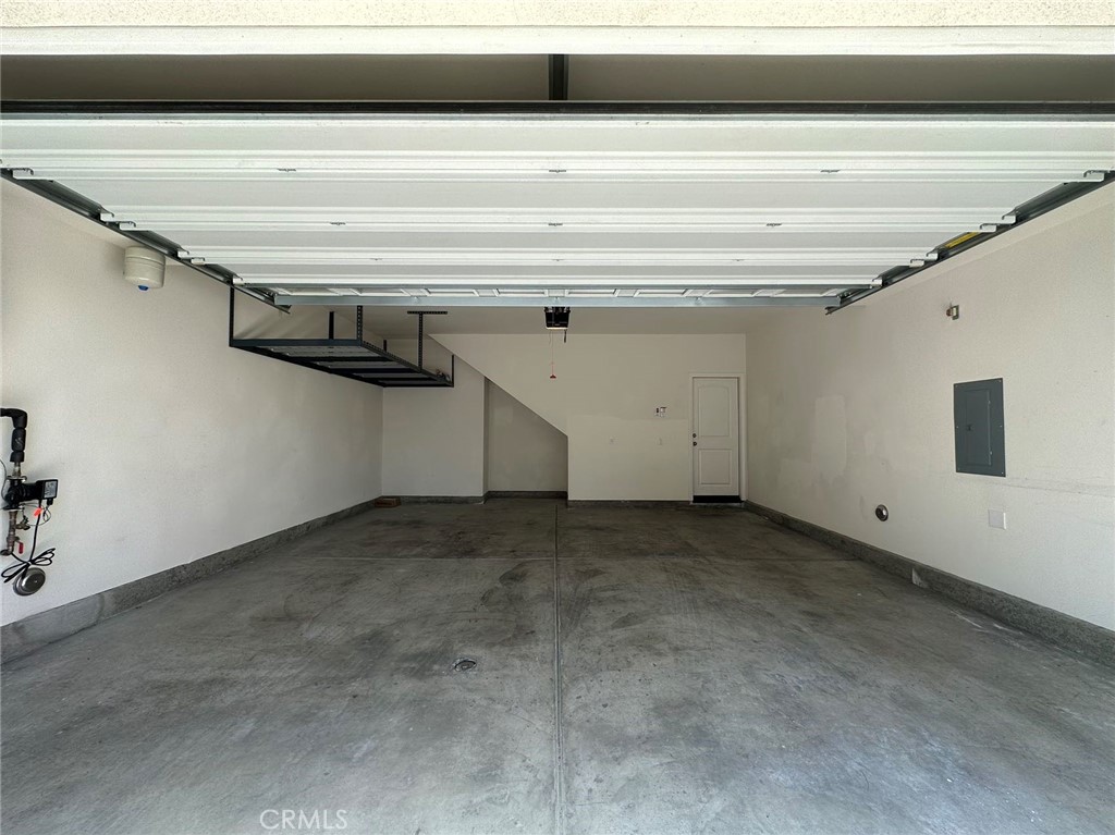 10517 Huxley Drive Rancho Cucamonga, CA 91730 - Photo 14 of 16 a view of a garage