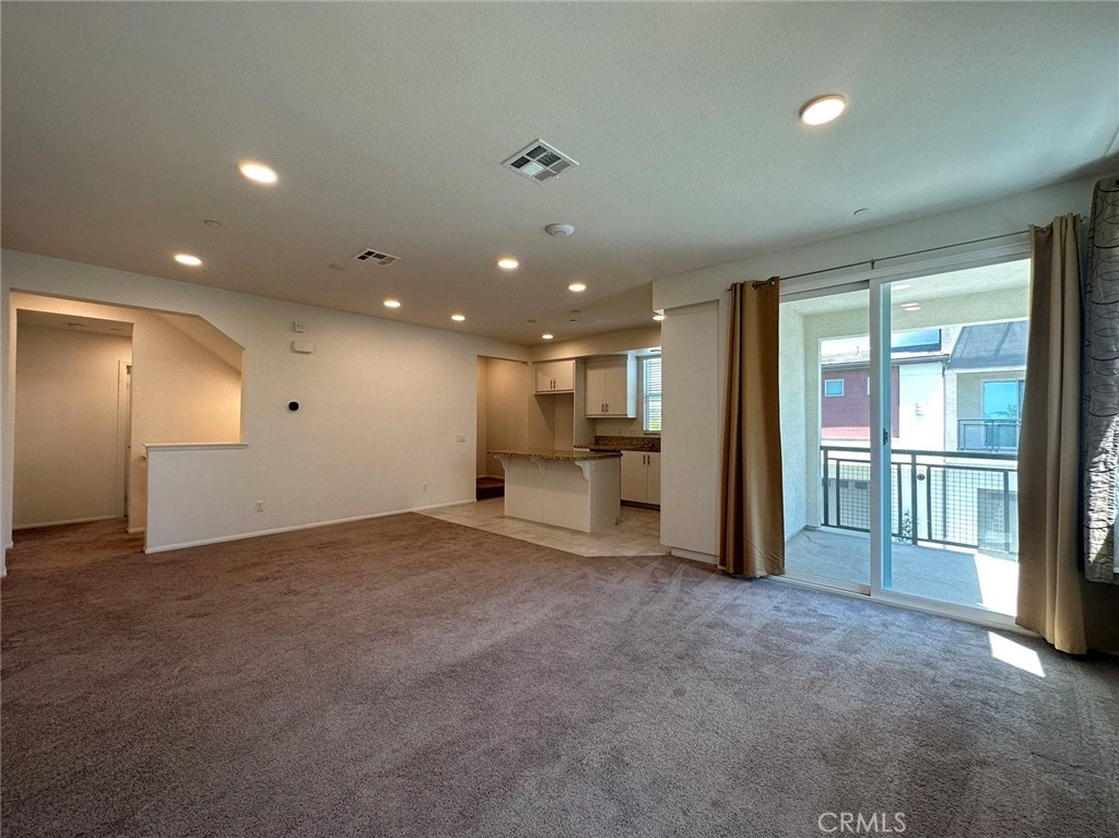 10517 Huxley Drive Rancho Cucamonga, CA 91730 - Photo 2 of 16 a view of an empty room with a window