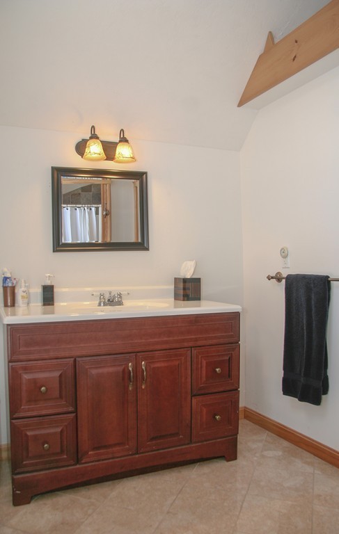 52 Marlboro Road Berlin, MA 01503 - Photo 18 of 30 a bathroom with a sink and a mirror