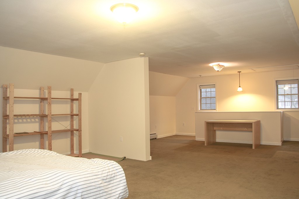 52 Marlboro Road Berlin, MA 01503 - Photo 25 of 30 a bedroom with a bed and a window