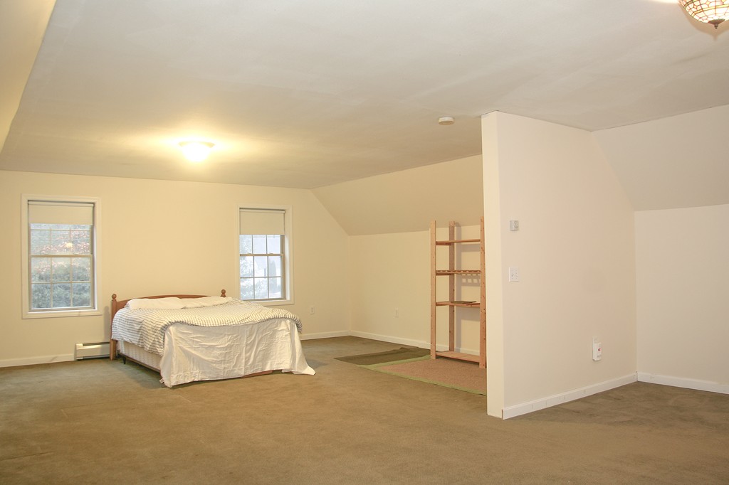 52 Marlboro Road Berlin, MA 01503 - Photo 26 of 30 a spacious bedroom with a bed and a cabinets