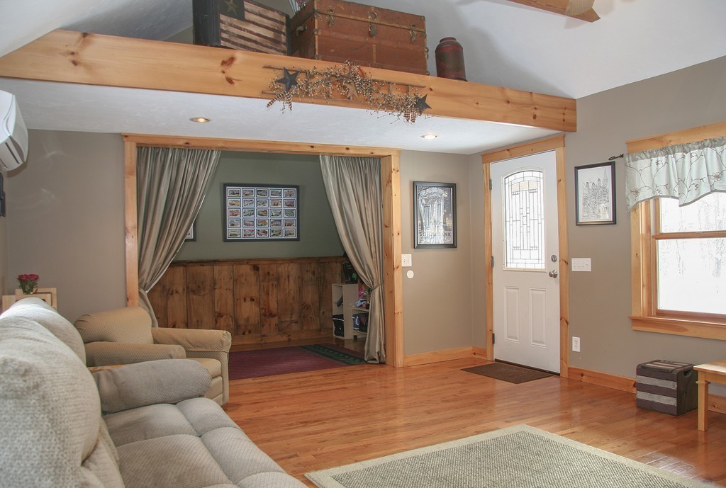 52 Marlboro Road Berlin, MA 01503 - Photo 3 of 30 a living room with furniture and a window