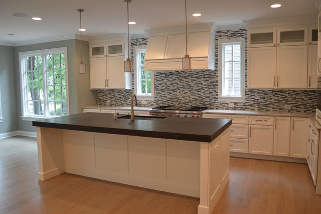 420 Washington Street Glenview, IL 60025 - Photo 8 of 17 a kitchen with granite countertop a sink and cabinets