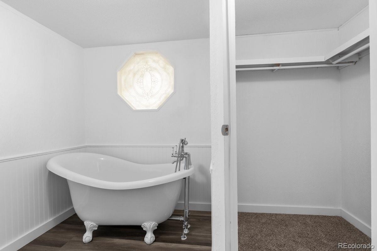 400 Hickory Street Fort Collins, CO 80524 - Photo 15 of 28 a bathroom with a tub and a sink