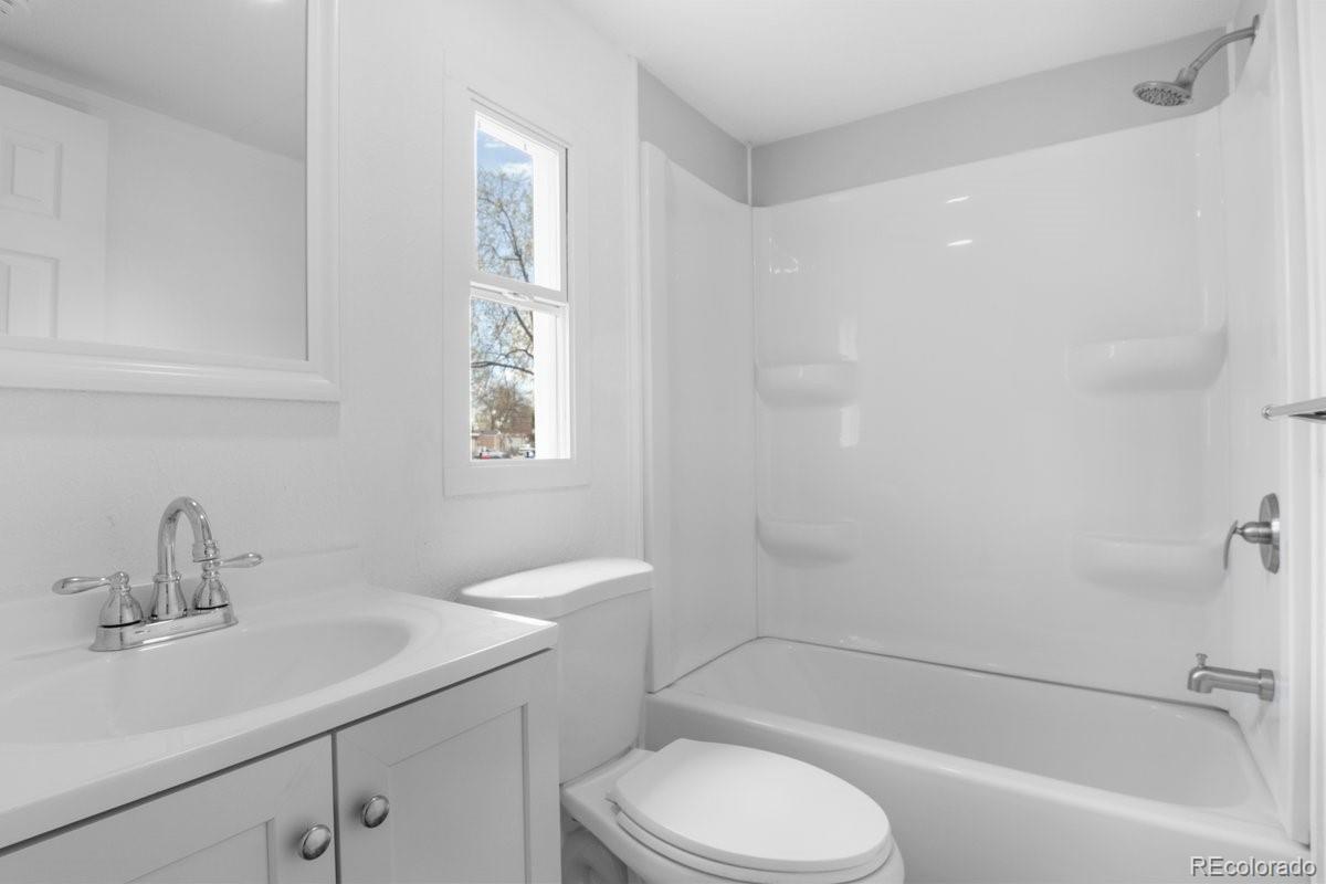 400 Hickory Street Fort Collins, CO 80524 - Photo 20 of 28 a bathroom with a sink toilet and shower