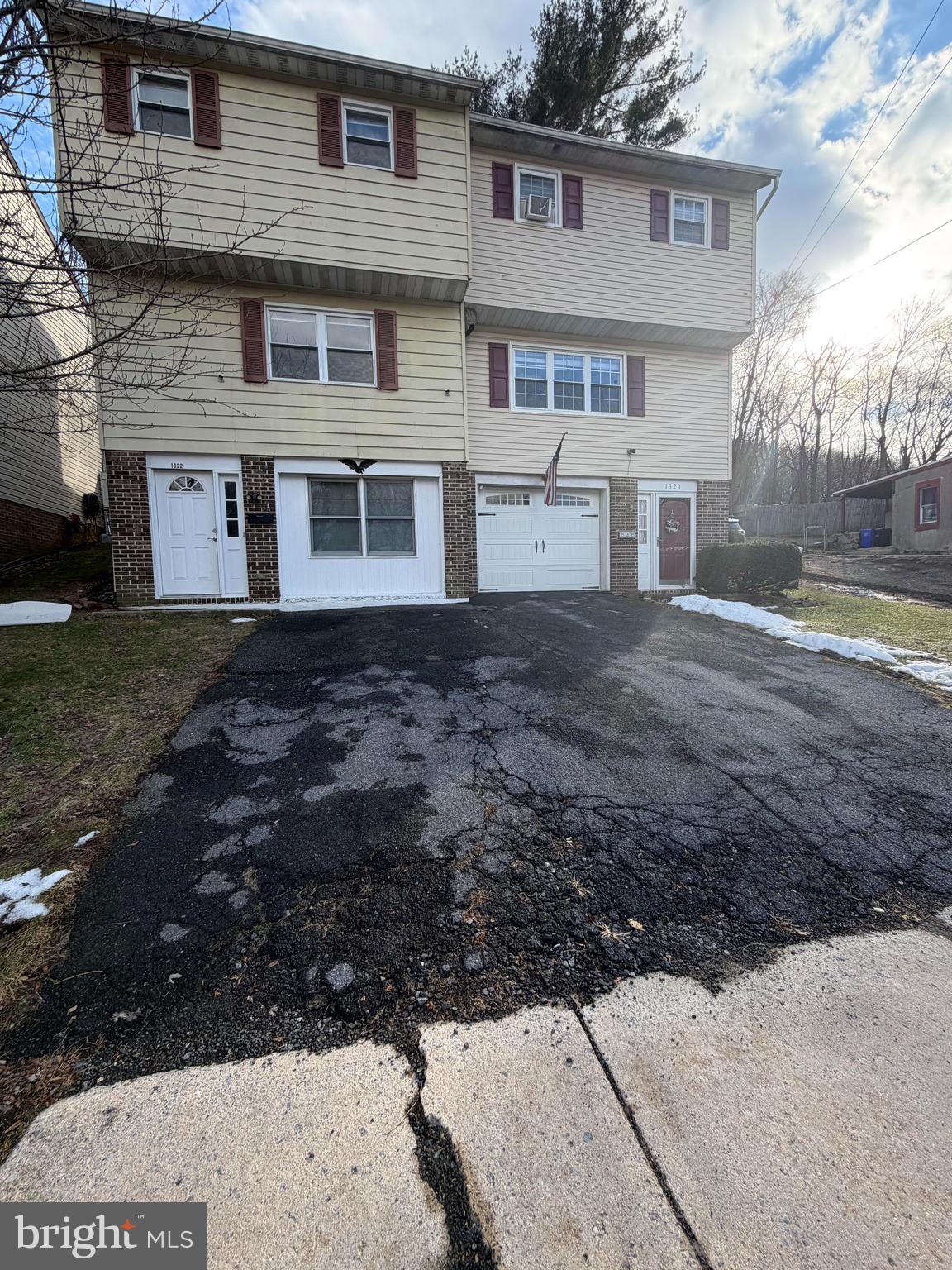 1322 Fairview Street Reading, PA 19602 - Photo 2 of 2 a view of a house with a yard